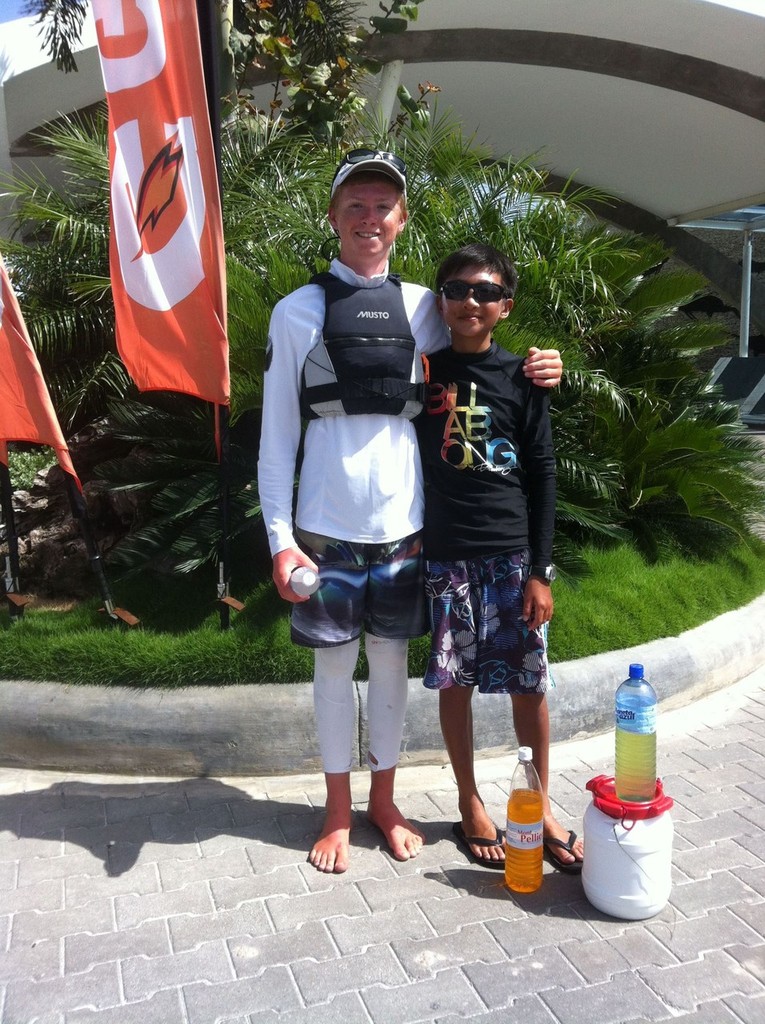 2nd placed Samuel Neo (SIN119) with 32nd placed Tim Adair (NZL4429) &copy; John Adair